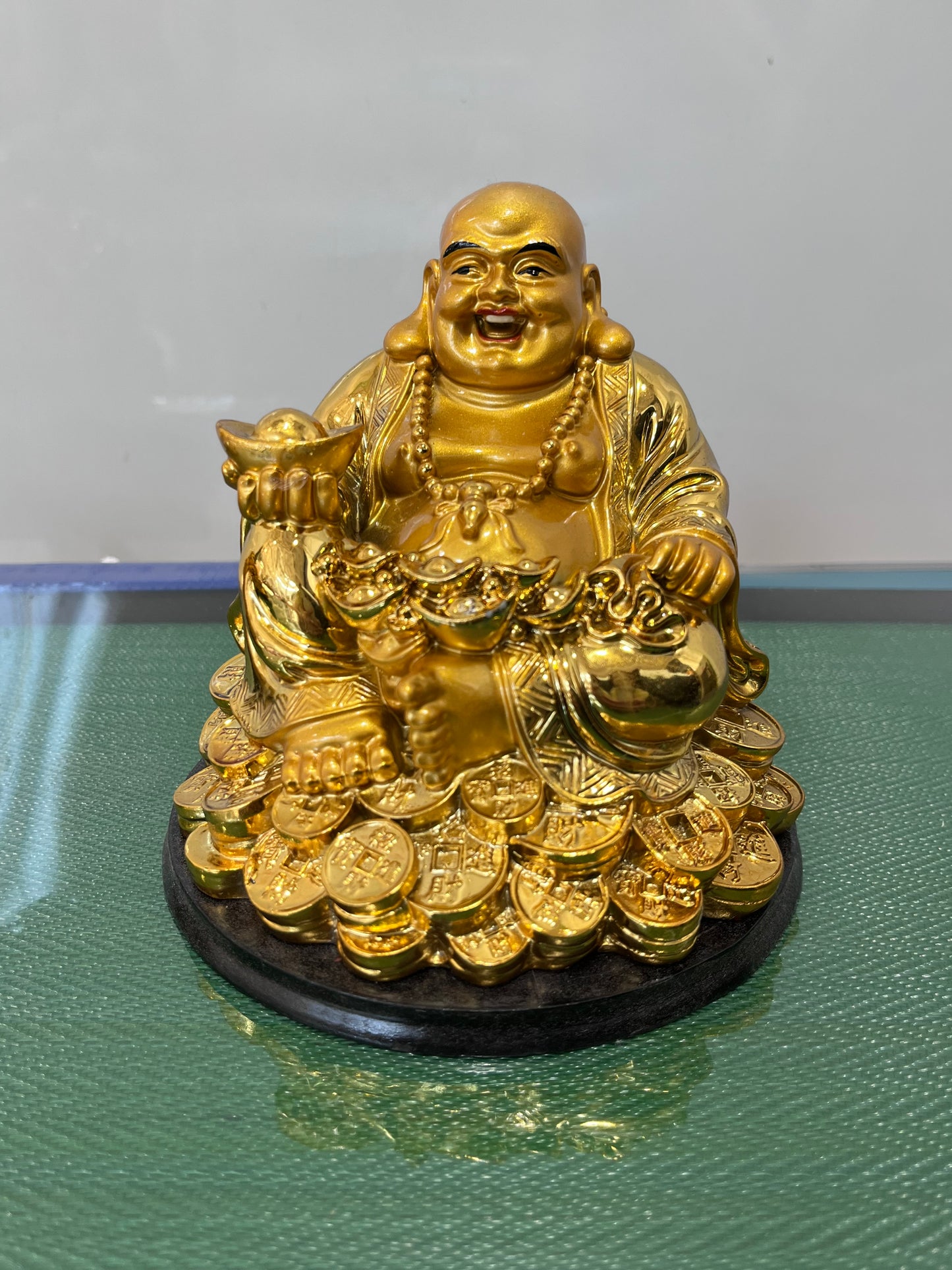 Golden Buddha with rich
