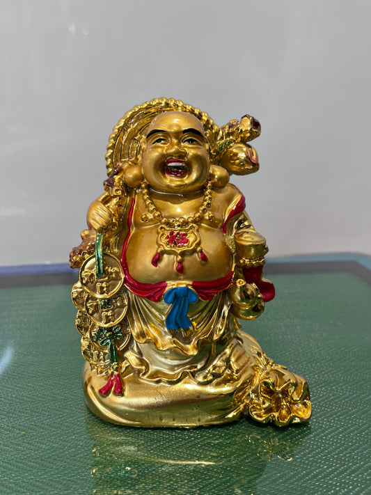 Golden Buddha on hand